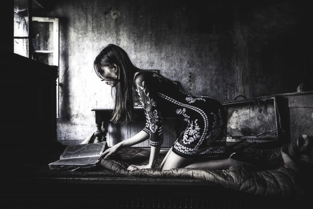 Woman Reading Old Book by Georgios Bero — canvas wall art