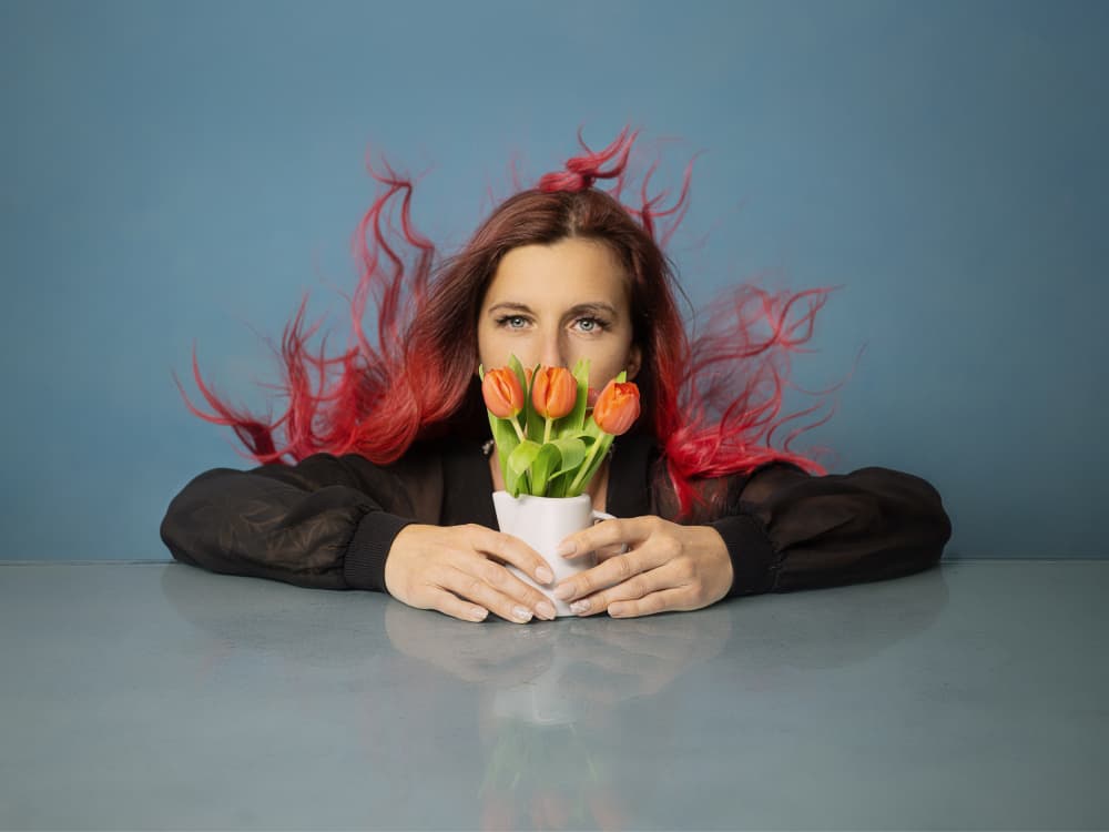 Red Hair and Orange Tulips by Michael Allmaier — canvas wall art