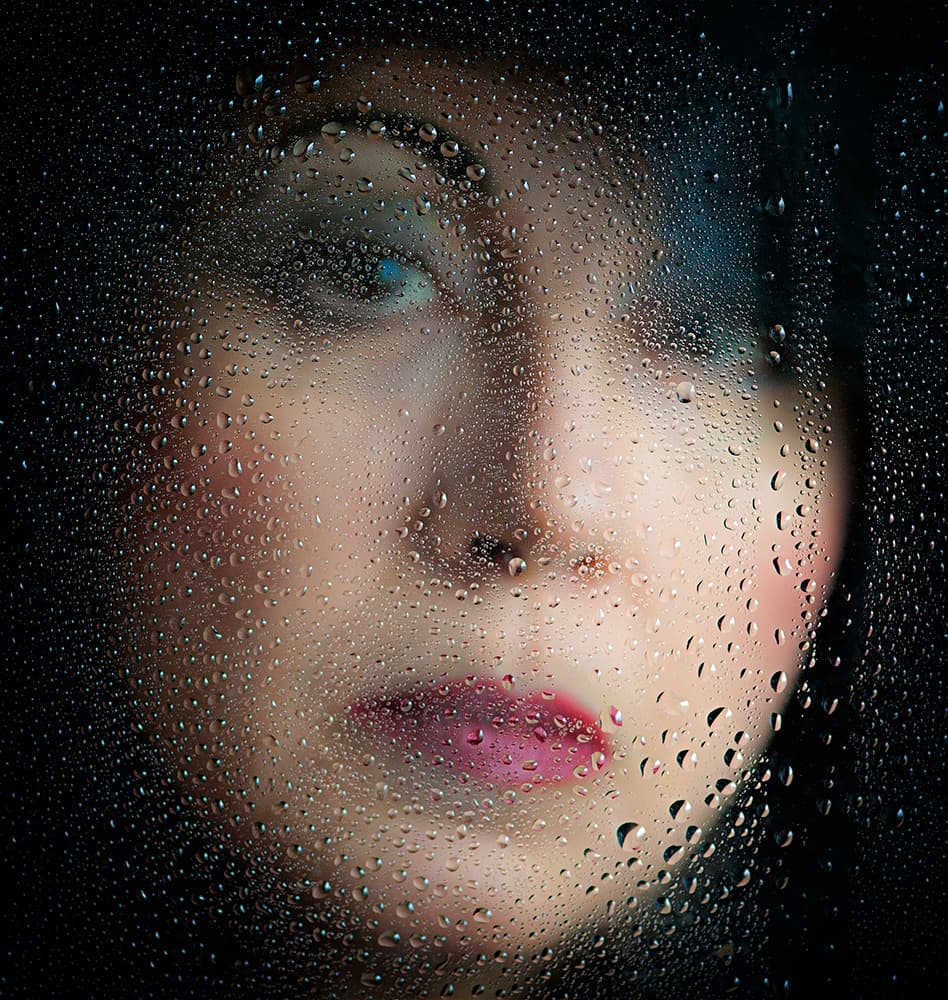 Woman Through Raindrops by Aida Ianeva — canvas wall art