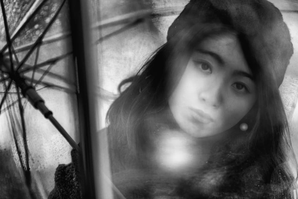 Pensive Woman Rainy Window by Daisuke Kiyota — canvas wall art