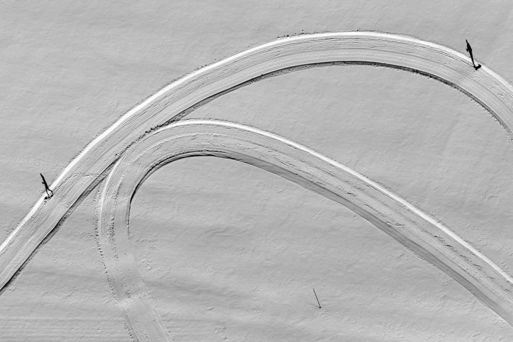 Curved Ski Trails by Primož Kožuh — canvas wall art
