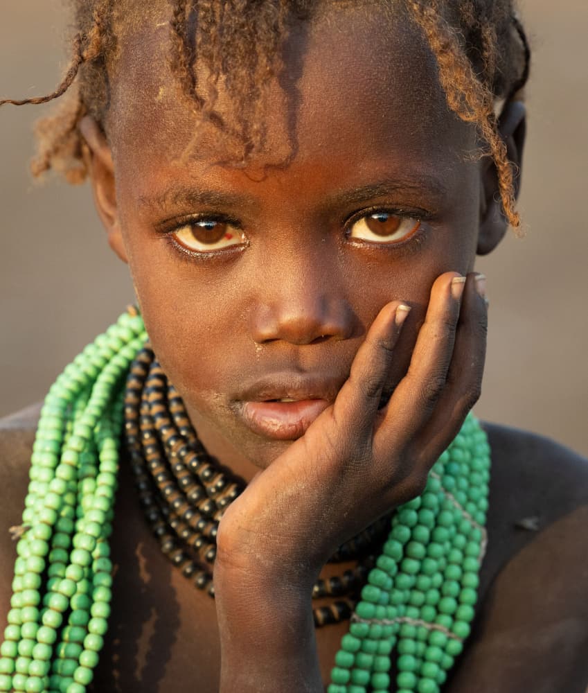 Pensive African Child by Hamza Qarooni — canvas wall art