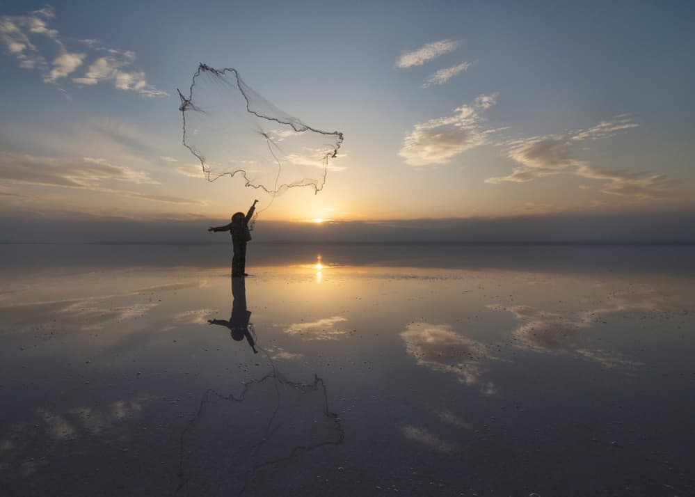 Sunset Fisherman Reflection by Feyzullah Tunç — canvas wall art