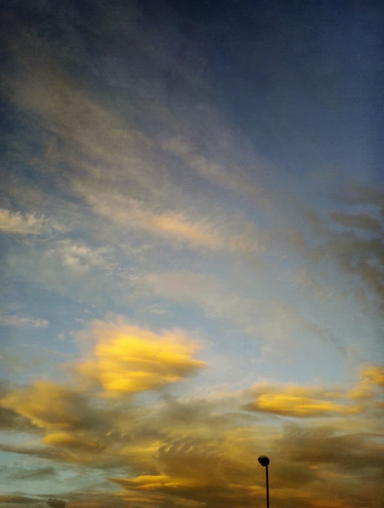 Dusk Golden Clouds by Angelo Cerantola — canvas wall art