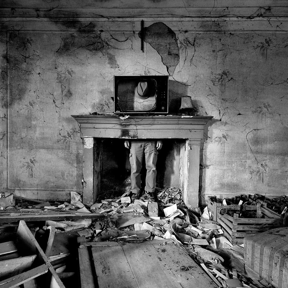 Man in a Fireplace by Carlo Ferrara — canvas wall art