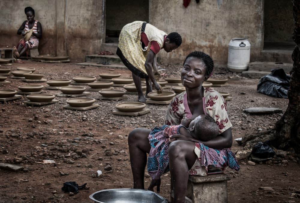 African Mother's Smile by Joxe Inazio Kuesta Garmendia — canvas wall art