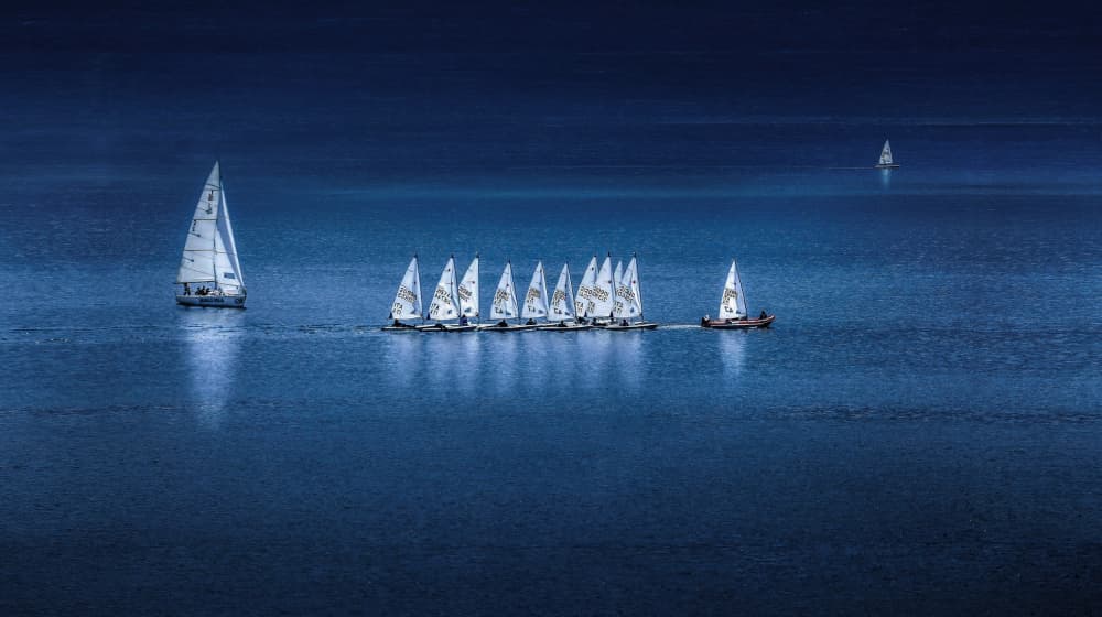 Deep Blue Sailing Fleet by Kenneth-Wei Zeng — canvas wall art