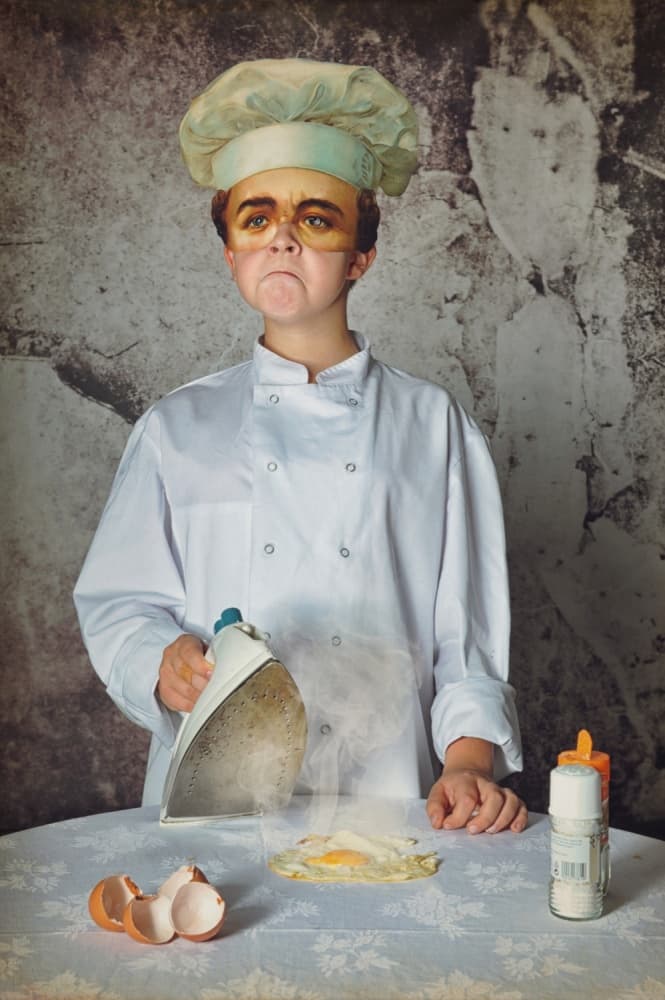 Young Chef Cooking Mishap by Monika Vanhercke — canvas wall art