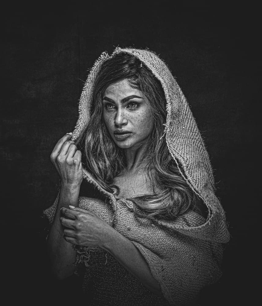 Pensive Woman in Burlap by PARTHA BHATTACHARYYA — canvas wall art