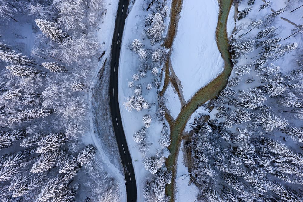 Winding Winter Road by Jure Kravanja — canvas wall art