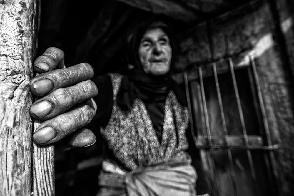 Elderly Woman's Grip by Feyzullah Tunç — canvas wall art