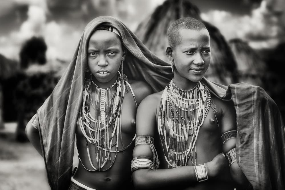 Young Tribal Women by Piet Flour — canvas wall art