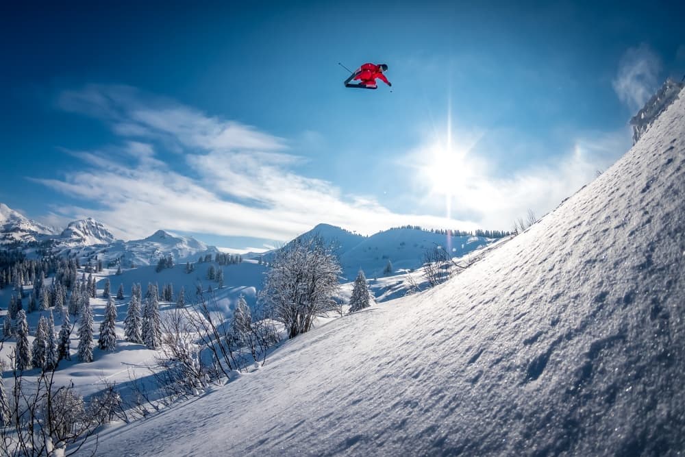 Skier Soaring Winter Mountains by Tristan Shu — canvas wall art