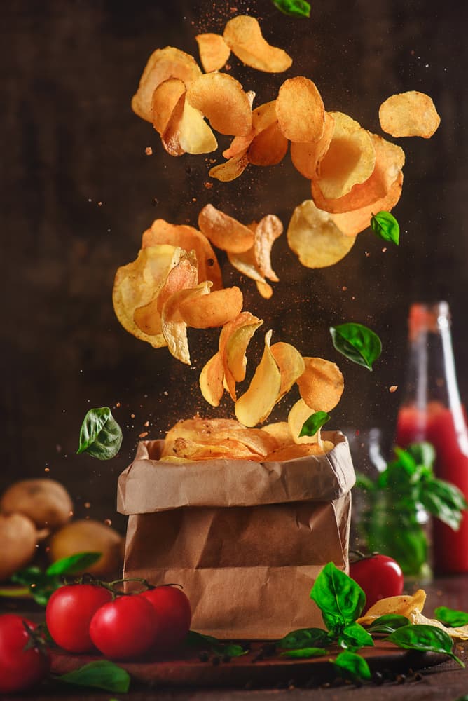 Falling Savory Chips by Dina Belenko — canvas wall art