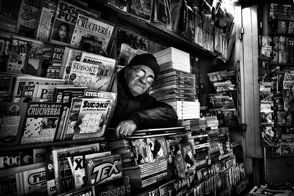 Old Newsstand Vendor by Antonio Grambone — canvas wall art
