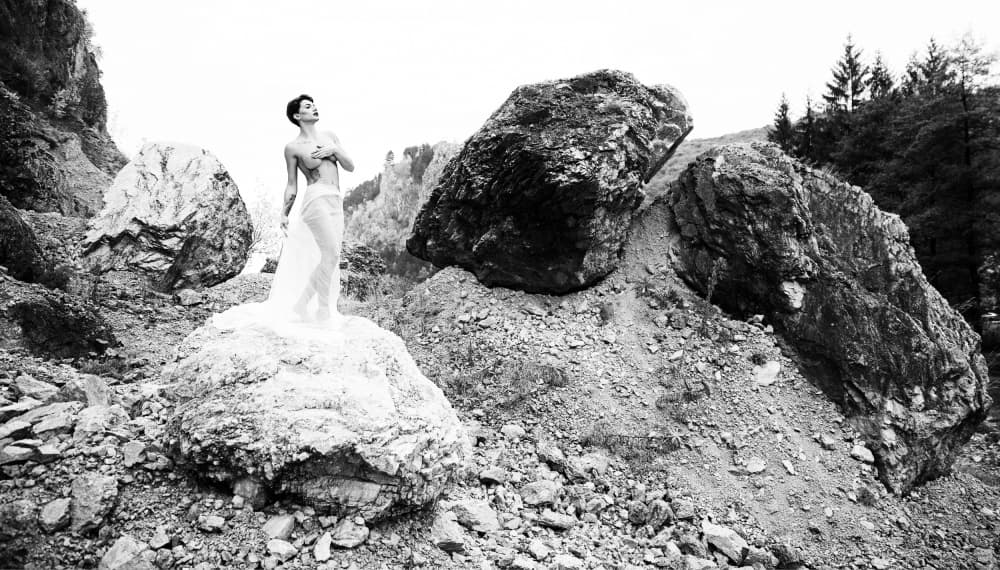 Ethereal Figure Among Rocks by Julien Oncete — canvas wall art