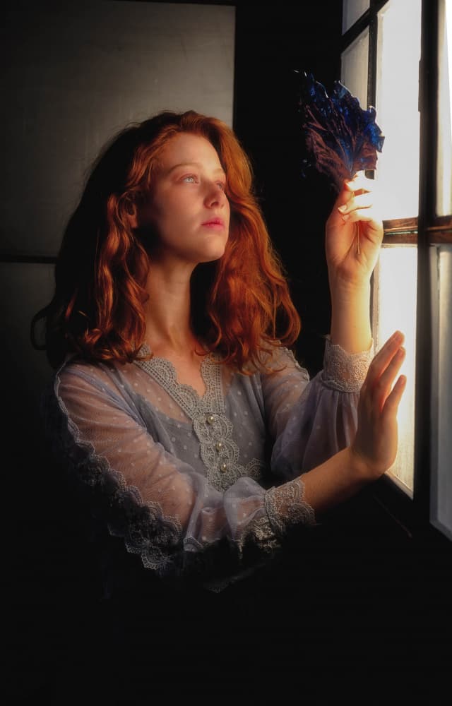Contemplative Redhead by Window by Tali Stein — canvas wall art