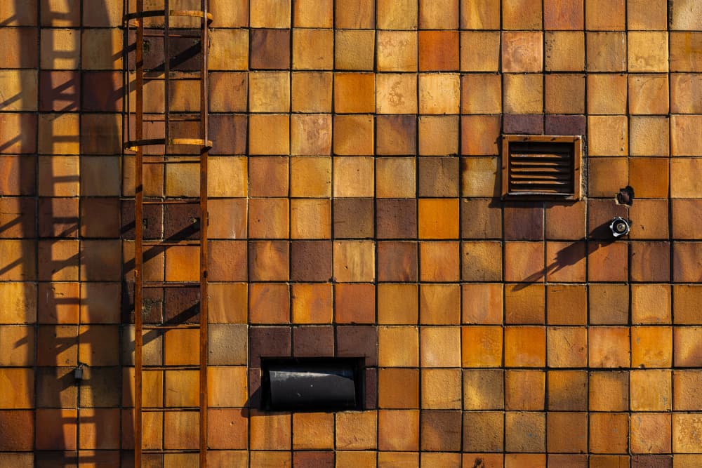 Warm Tiled Facade by Peter Hrabinsky — canvas wall art