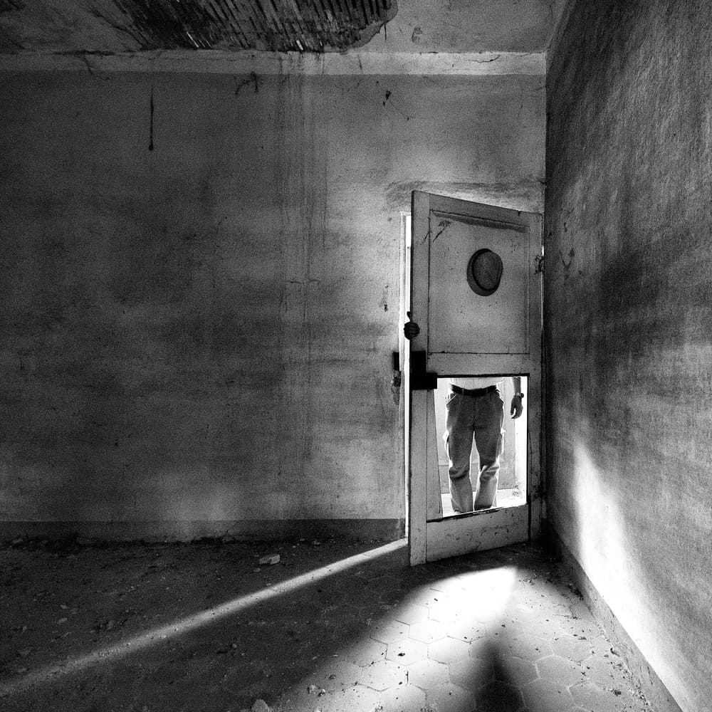 Mysterious Doorway Figure by Carlo Ferrara — canvas wall art