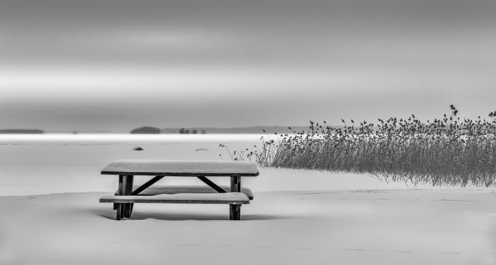 Snowy Lakeside Picnic by Ludwig Riml — canvas wall art