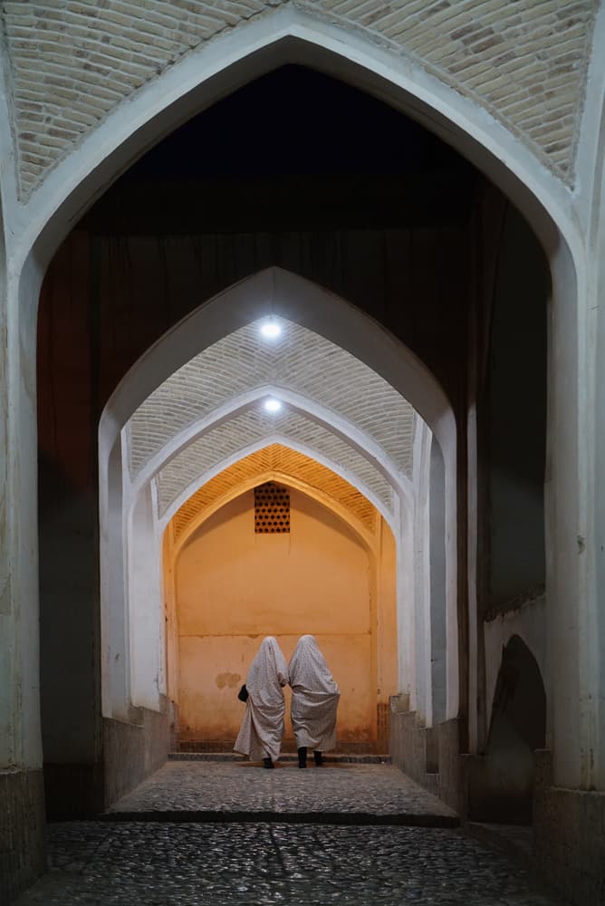 Women in Ancient Passage by Fatma GÖKMEN — canvas wall art
