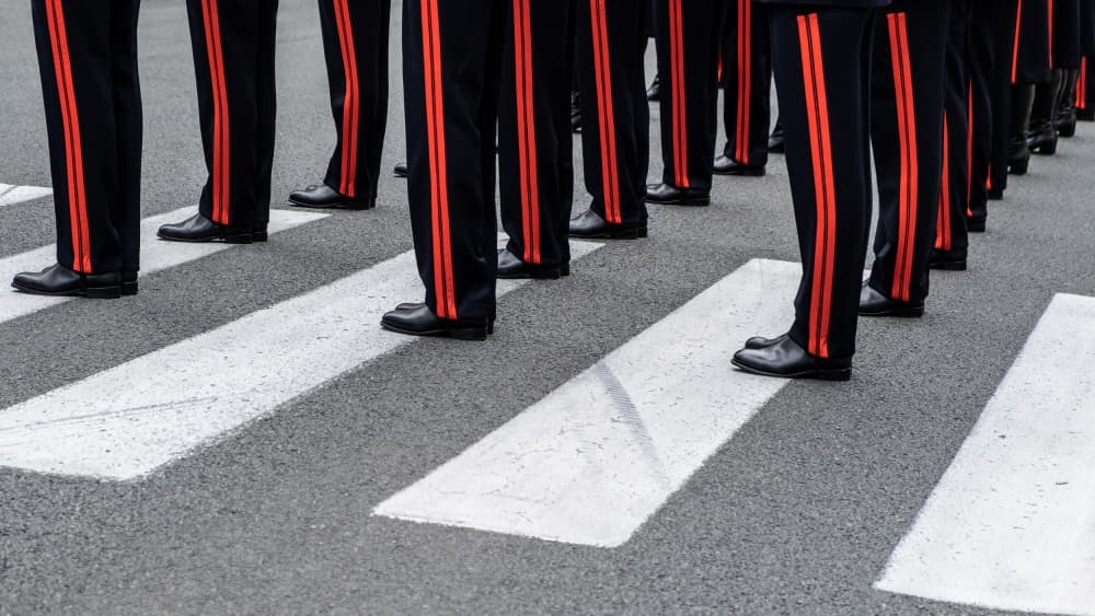 Marching Uniforms on Street by Lus Joosten — canvas wall art