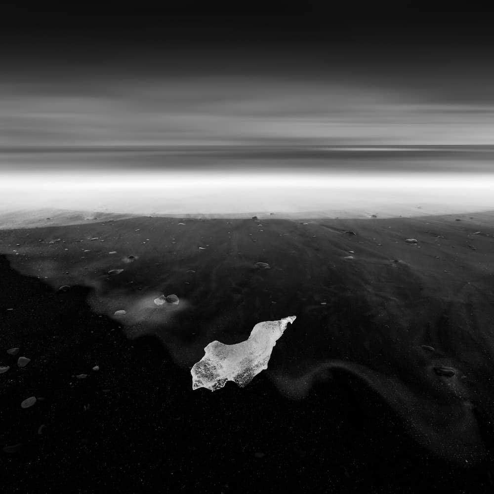 Ice on Black Sand by Tony Xu — canvas wall art