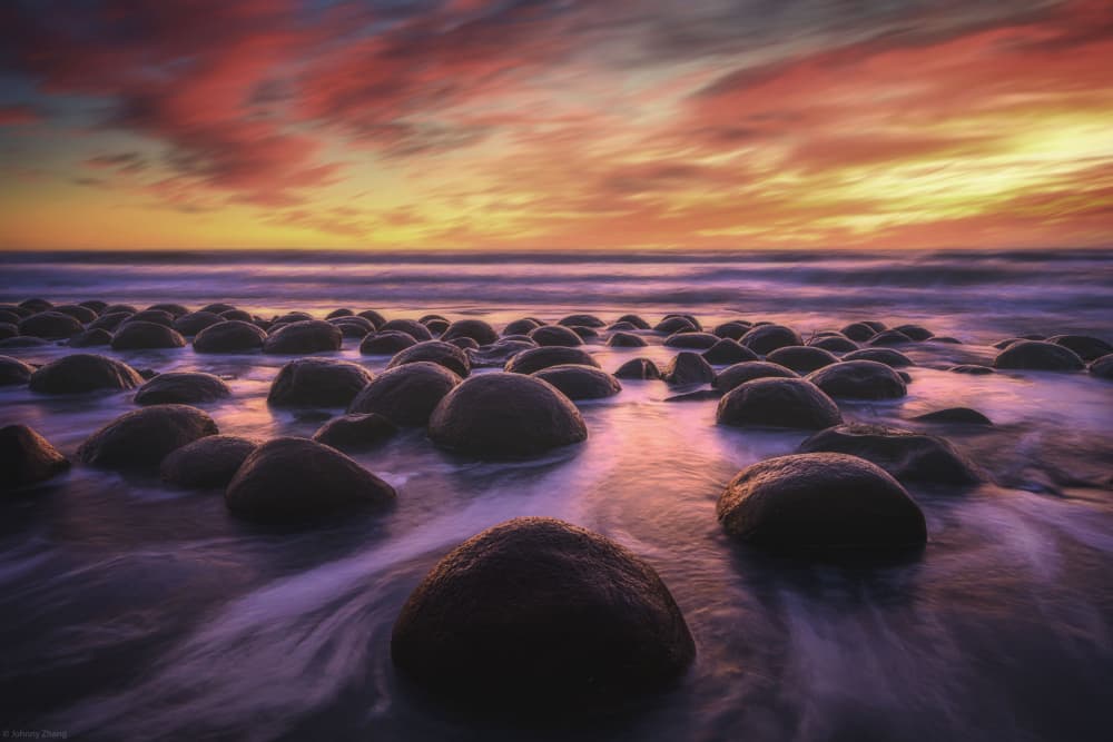 Vibrant Coastal Stone Sunset by Johnny Zhang — canvas wall art