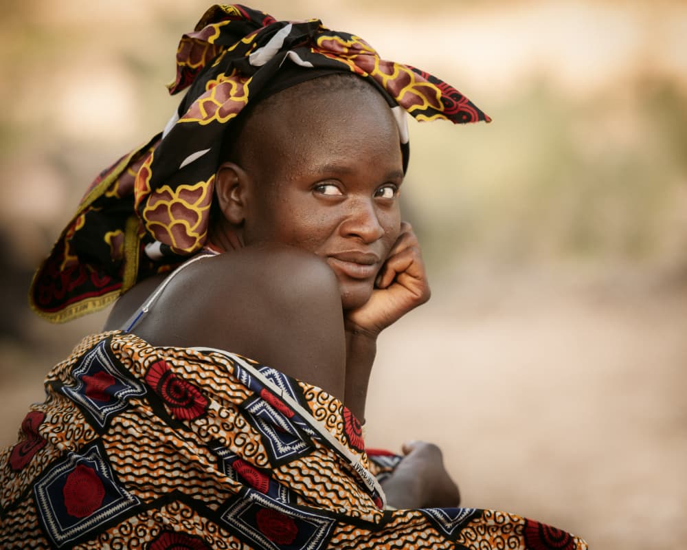 African Woman's Gentle Gaze by Tori E Bohn — canvas wall art