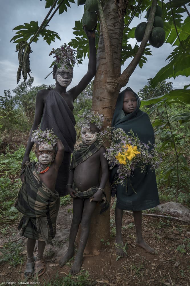 African Children with Crowns by Sarawut Intarob — canvas wall art