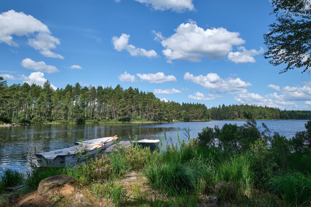 Serene Lake Shore Boats by Geertjan Plooijer — canvas wall art