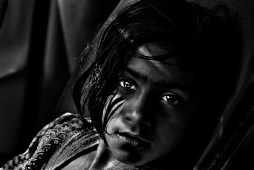 Shadowed Child Portrait by Giovanni Cavalli — canvas wall art
