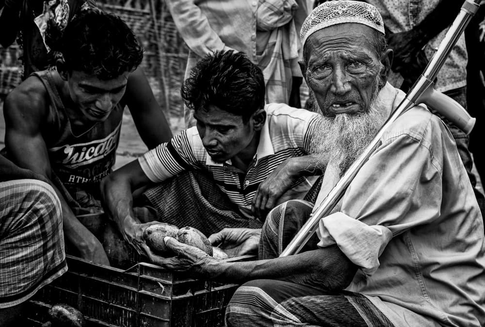 Market Elder and Youth by Joxe Inazio Kuesta Garmendia — canvas wall art