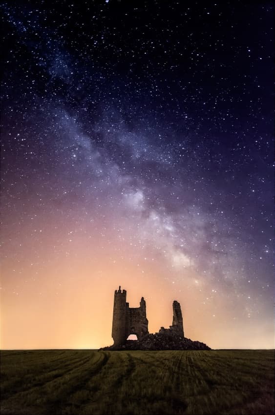 Milky Way Castle Ruins by Javier de la Torre — canvas wall art