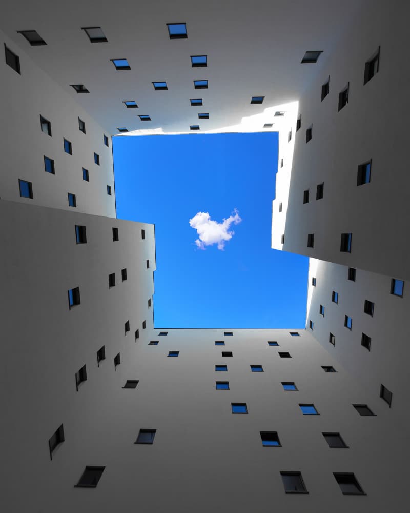 White Building Blue Sky by Jorge Pimenta — canvas wall art
