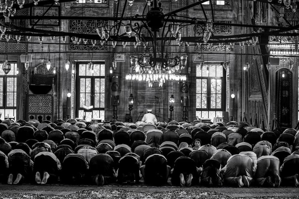 Humble Prayer in Mosque by Marco Tagliarino — canvas wall art