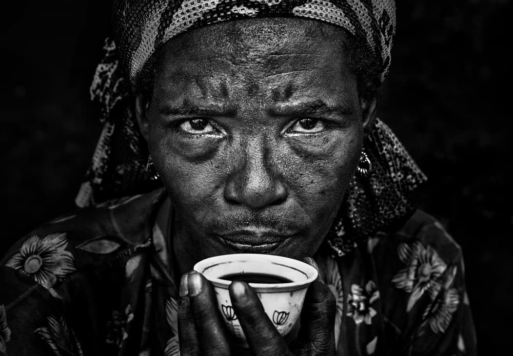 African Coffee Gaze by Joxe Inazio Kuesta Garmendia — canvas wall art