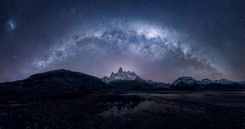 Milky Way Over Peaks by Yanny Liu — canvas wall art