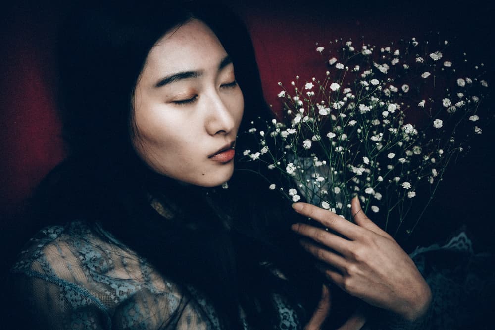 Serene Woman with Flowers by Nobu Ishijima — canvas wall art