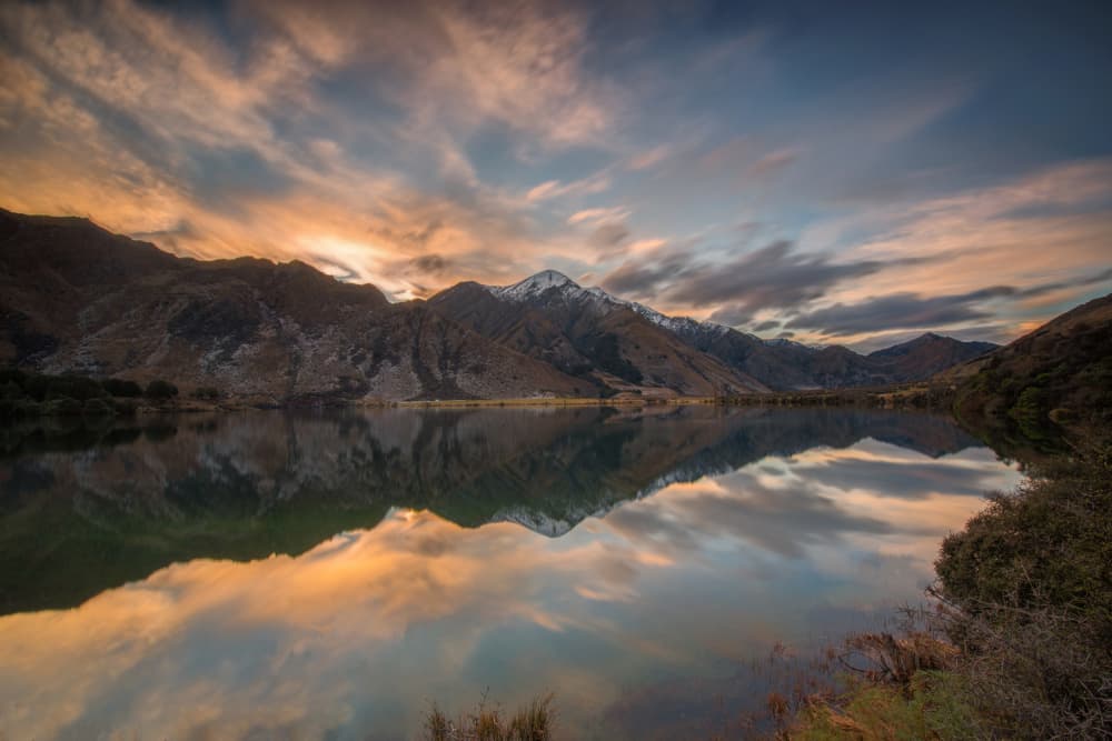 Golden Hour Mountain Reflection by Jay Zhu — canvas wall art