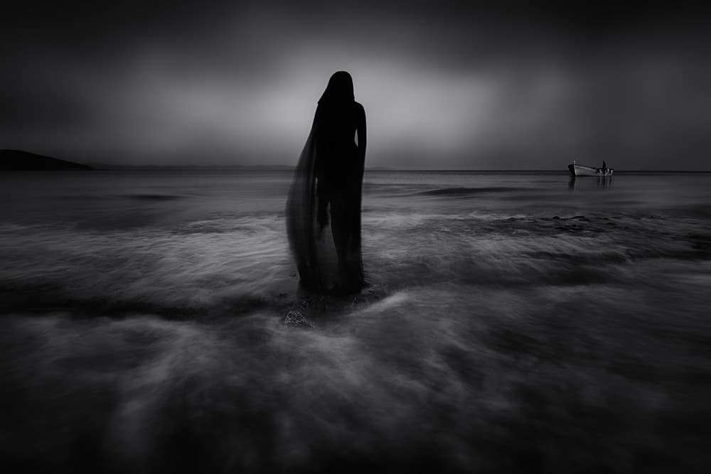 Solitary Silhouette Seascape by Maria Kaimaki — canvas wall art