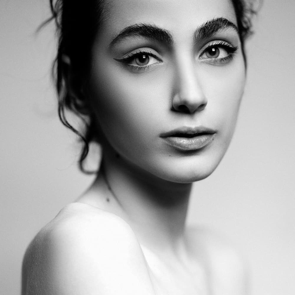 Elegant Female Gaze by Amin Hamidnezhad — canvas wall art