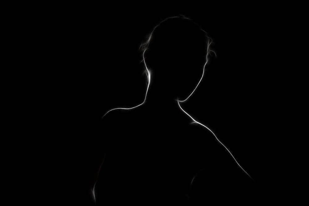 Glowing Woman Silhouette by Paulo Medeiros — canvas wall art