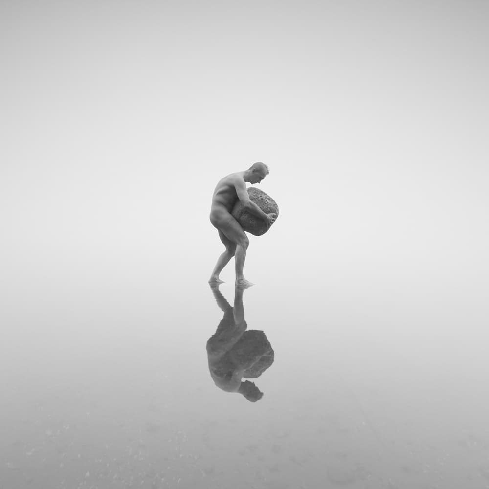 Man's Heavy Stone Reflection by Leszek Paradowski — canvas wall art
