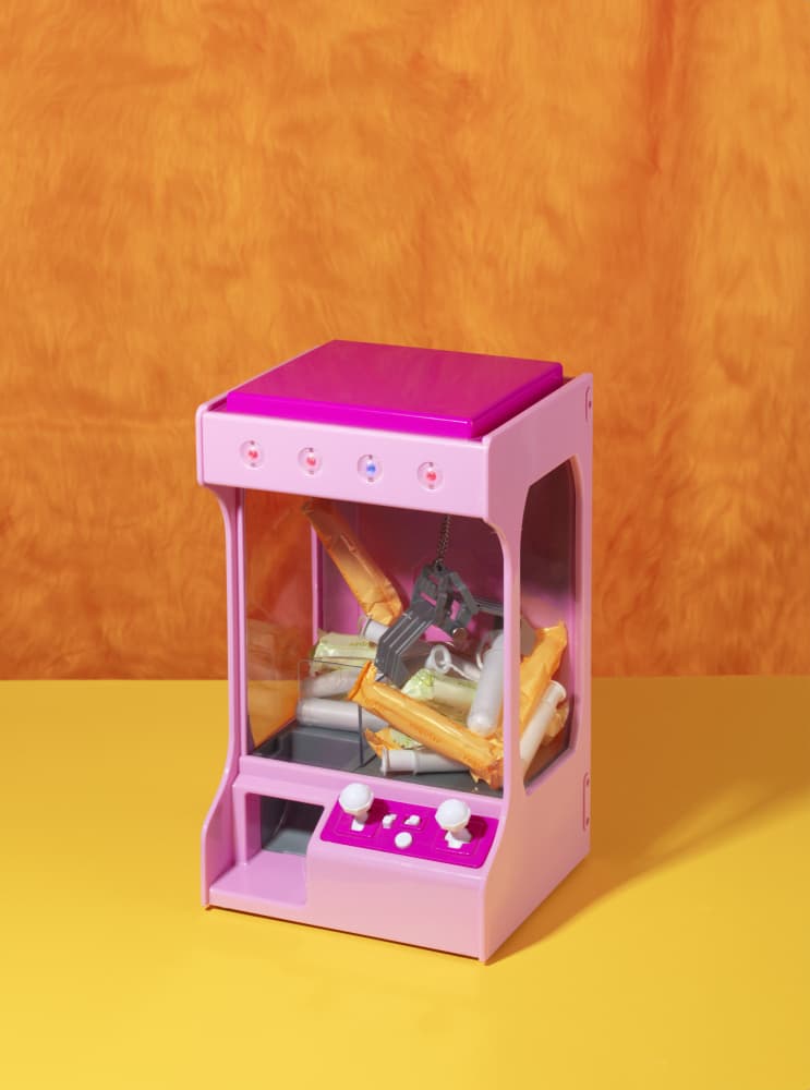 Pink Tampon Claw Machine by Julia Ramiro — canvas wall art