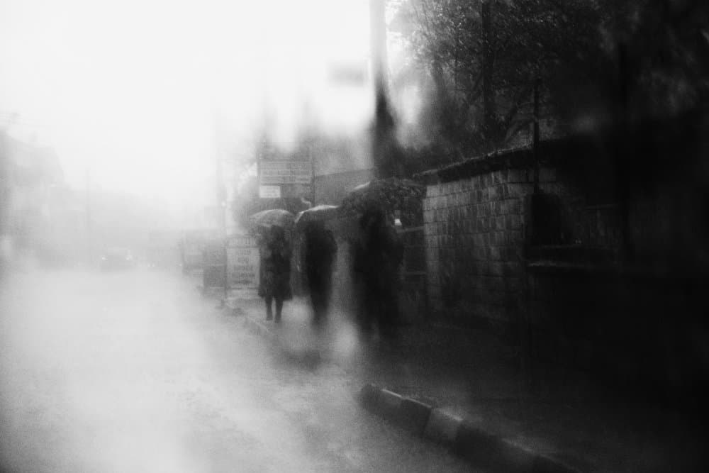 Foggy Street Umbrellas by Ali Ayer — canvas wall art