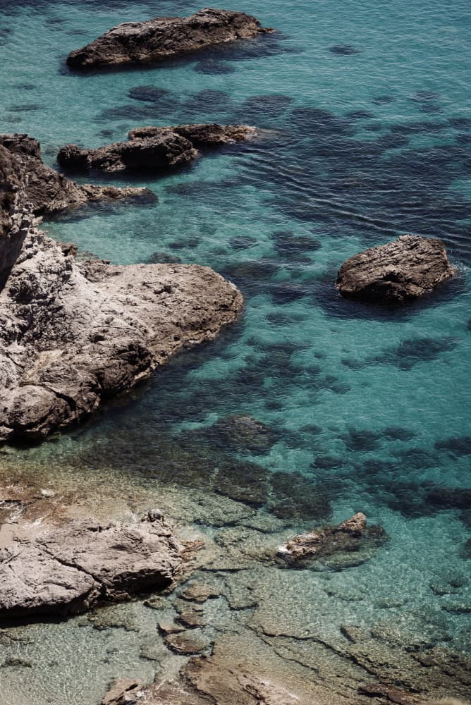 Turquoise Ocean Rocks by Photolovers — canvas wall art