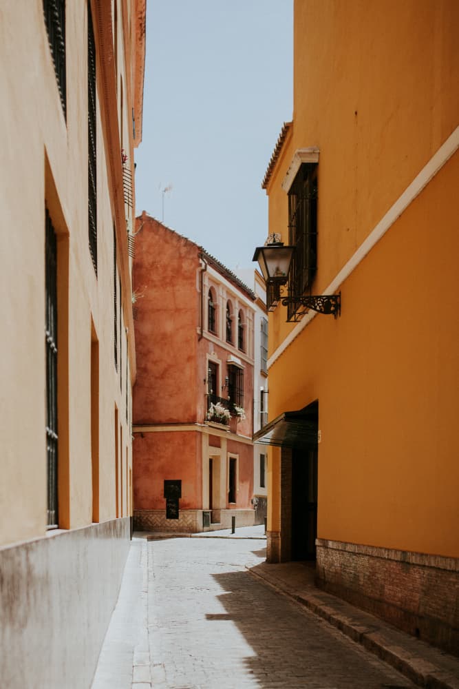 Sunlit European Alley by Claudia Casal — canvas wall art