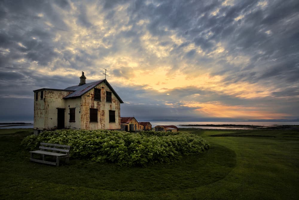 Rustic Coastal Sunset House by Þorsteinn H. Ingibergsson — canvas wall art