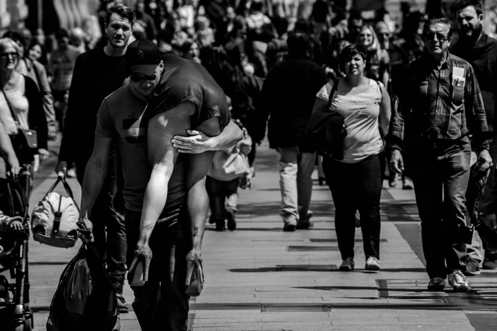 City Piggyback Ride by Alejandro Marcos — canvas wall art